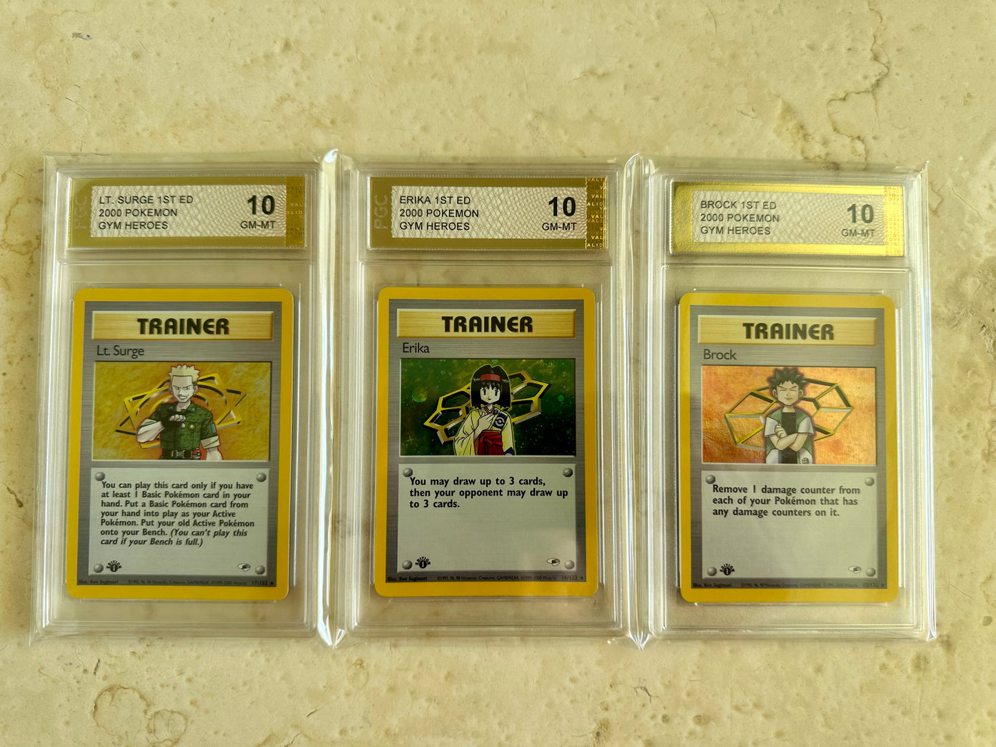 3X 1ST EDITION GYM HEROES TRAINERS ERIKA LT. SURGE BROCK PSA POKEMON PGC 15/132