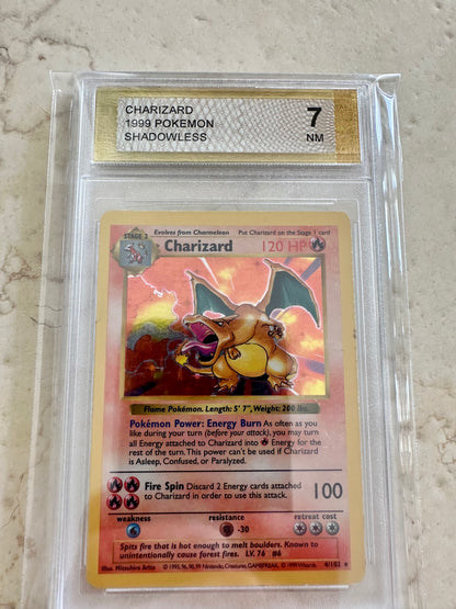 CHARIZARD SHADOWLESS 7 BASE 1999 HOLO PGC POKEMON PSA 4/102 CARD GEM MINT